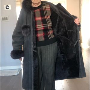 Women’s winter shearling coat with fur trim.